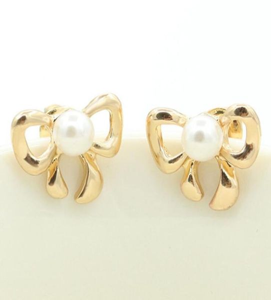 big pearl earrings cute hollow bow knot earring stud gold plated for women girls party ear jewelry 715081, Golden;silver
big pearl earrings cute hollow bow knot earring stud gold plated for women girls party ear jewelry 715081, Golden;silver
