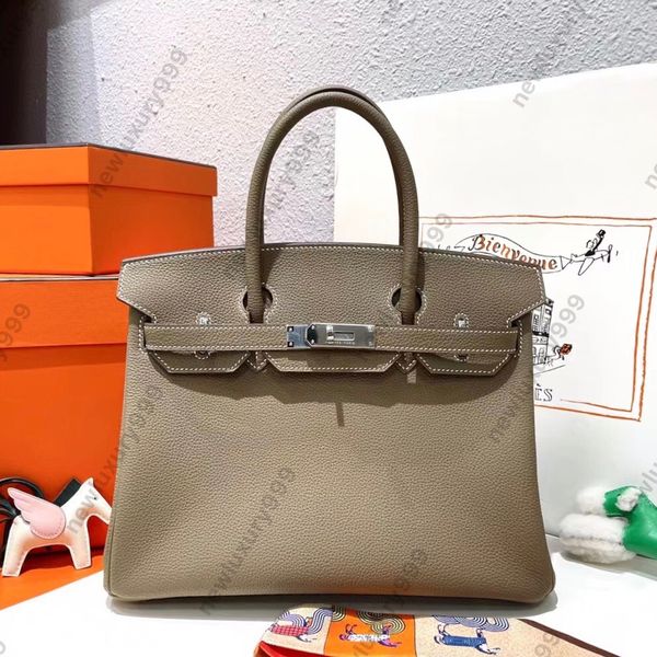 designer fully handmade tote classic handbag luxury women's bag using imported original togo leather beeswax thread sewn 24k real gold
designer fully handmade tote classic handbag luxury women's bag using imported original togo leather beeswax thread sewn 24k real gold
