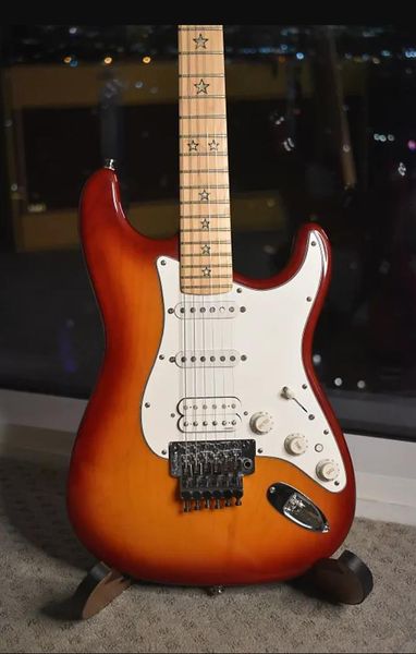 custom richie sambora signature cherry sunburst 1994 electric guitar floyd rose tremolo bridge locking nut, abalone star inlay, ssh pickups
custom richie sambora signature cherry sunburst 1994 electric guitar floyd rose tremolo bridge locking nut, abalone star inlay, ssh pickups