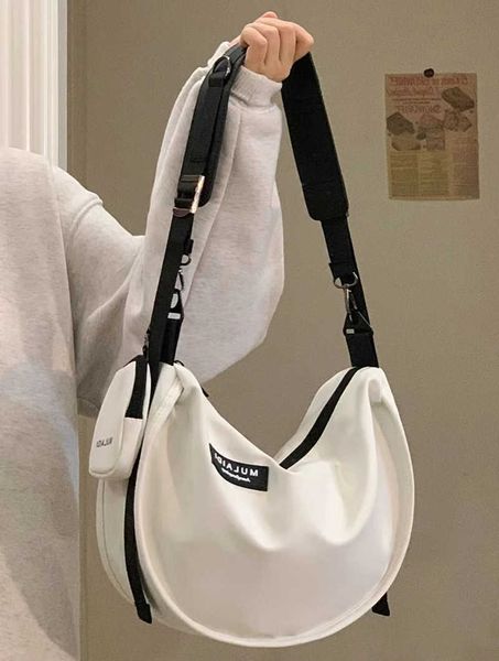 leisure dumplings sports style cross-body bag women's large capacity canvas bag students' one-shoulder commuting bag tide in class
leisure dumplings sports style cross-body bag women's large capacity canvas bag students' one-shoulder commuting bag tide in class