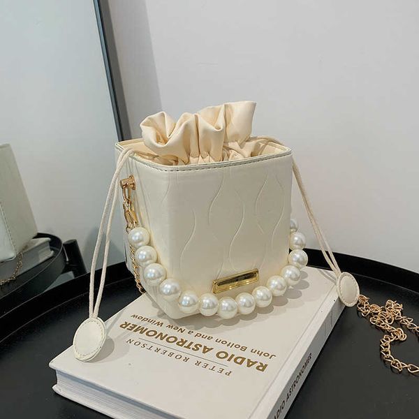 summer bag 2021 new net red foreign style bucket bag leisure sense simple messenger bag pearl portable women's bag
summer bag 2021 new net red foreign style bucket bag leisure sense simple messenger bag pearl portable women's bag