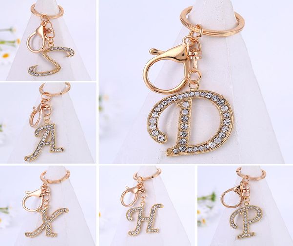 new rhinestone crystal letter pendant keychain gold color 26 english letters az key ring fashion jewelry key chain gifts3116844, Silver
new rhinestone crystal letter pendant keychain gold color 26 english letters az key ring fashion jewelry key chain gifts3116844, Silver