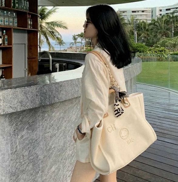 beige shoulder beach bag chain totes designer handbag women brand luxury pearl canvas large shopping capacity quality crossbody famous purse
beige shoulder beach bag chain totes designer handbag women brand luxury pearl canvas large shopping capacity quality crossbody famous purse