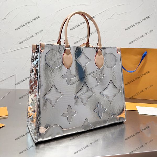 23ss designers women leather totes bags onthgo handbag shouder cross body shopping bag luxurys messenger ladies travel handbags pouch 35cm
23ss designers women leather totes bags onthgo handbag shouder cross body shopping bag luxurys messenger ladies travel handbags pouch 35cm