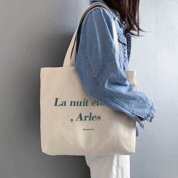 wind letter minimalist canvas bag minimalist large capacity portable shoulder bag ins fashionable printed tote bag
wind letter minimalist canvas bag minimalist large capacity portable shoulder bag ins fashionable printed tote bag