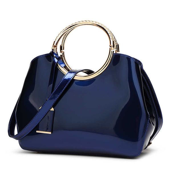 new trend bright lacquer leather carrying ring women's bag slugger bill of lading shoulder bag
new trend bright lacquer leather carrying ring women's bag slugger bill of lading shoulder bag