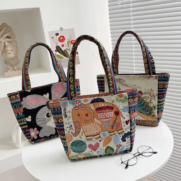 new knitted handheld tote bag with ethnic style embroidery middle aged mother's handheld bag small flower canvas small square bag
new knitted handheld tote bag with ethnic style embroidery middle aged mother's handheld bag small flower canvas small square bag