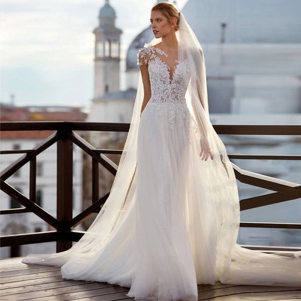 charming beach a line wedding dresses backless with lace appliques bridal gown sheer neck sleeveless bohemian robe de mariee, White 
charming beach a line wedding dresses backless with lace appliques bridal gown sheer neck sleeveless bohemian robe de mariee, White