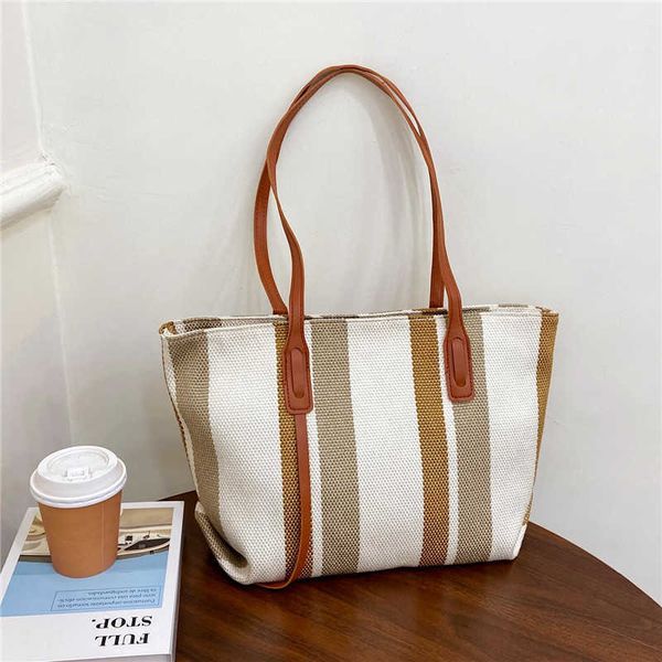 bag women's new korean portable mommy bag 2022 simple striped linen women's shopping large capacity shoulder bag
bag women's new korean portable mommy bag 2022 simple striped linen women's shopping large capacity shoulder bag