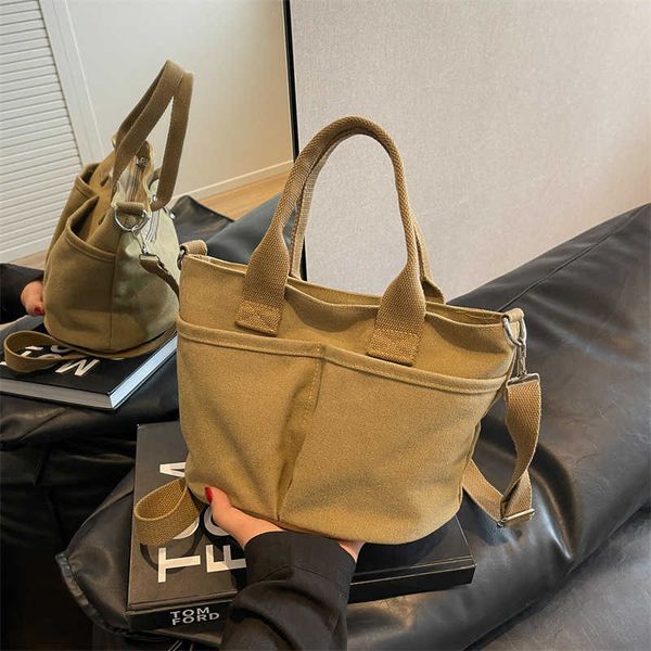 handheld canvas bag in version spring/summer new mom's shoulder bag casual women's crossbody bag
handheld canvas bag in version spring/summer new mom's shoulder bag casual women's crossbody bag