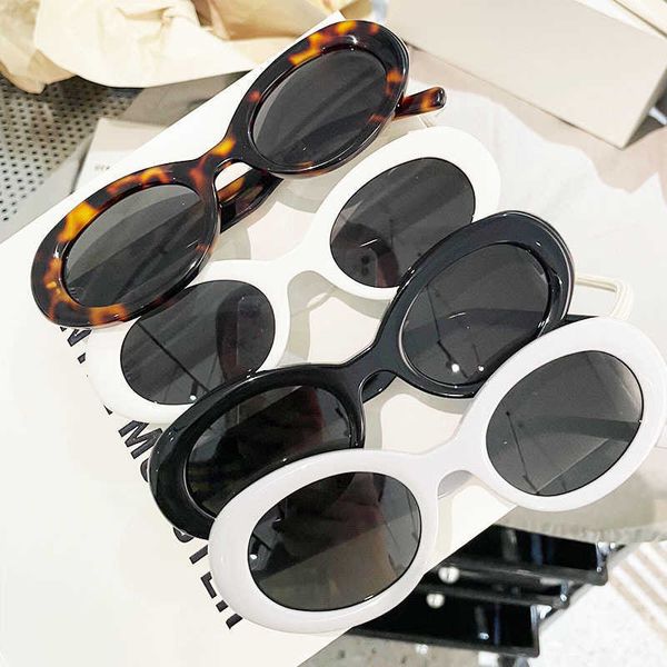 original quality star co branded oval cat eye for women with round frame sun and uv protection sunglasses, White;black
original quality star co branded oval cat eye for women with round frame sun and uv protection sunglasses, White;black