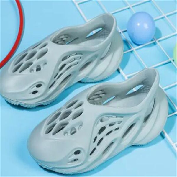 summer new coconut hole shoes fashion designer children's sandals hollow outfit soft sole beach shoes, Black;red
summer new coconut hole shoes fashion designer children's sandals hollow outfit soft sole beach shoes, Black;red