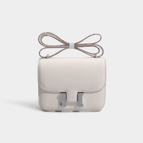 designer h home bag new style water diamond button kangkang premium leather tofu female stewardess with inlaid single shoulder messenger
designer h home bag new style water diamond button kangkang premium leather tofu female stewardess with inlaid single shoulder messenger