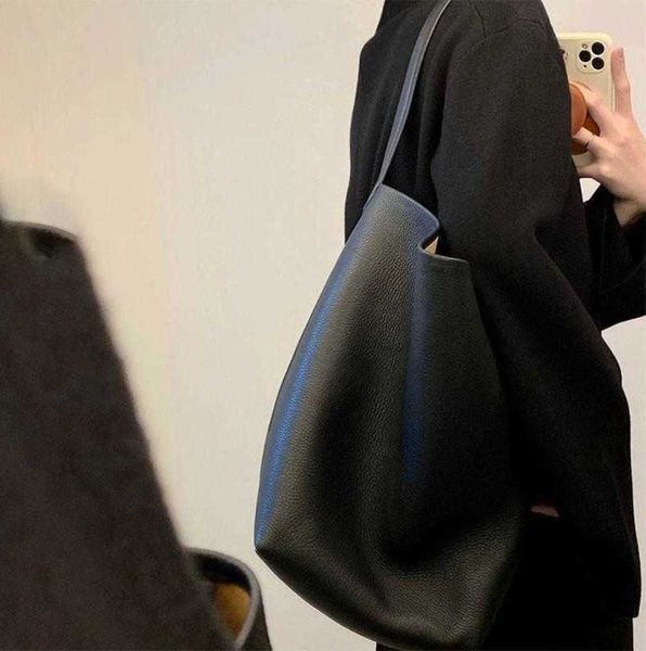 the row bag designer bucket bag small big and versatile new tote handbag large capacity single shoulder portable real fashion wholesale
the row bag designer bucket bag small big and versatile new tote handbag large capacity single shoulder portable real fashion wholesale