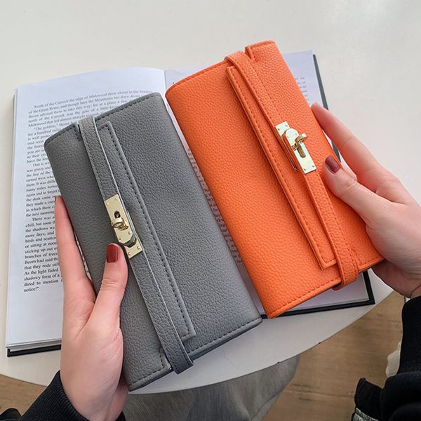 designer luxury women purse pure color pu material fashion versatile handbag with multiple slots litchi grain medium and long
designer luxury women purse pure color pu material fashion versatile handbag with multiple slots litchi grain medium and long