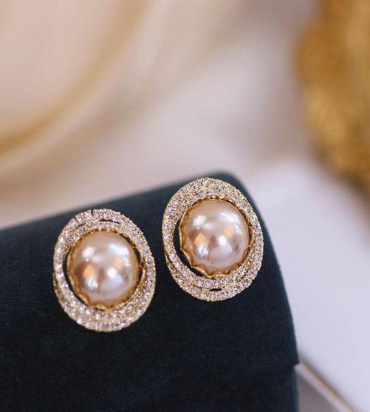 luxury shiny crystal rhinestone stud earrings for women fashion big imitation pearl bridal wedding jewelry gifts9142540, Golden;silver
luxury shiny crystal rhinestone stud earrings for women fashion big imitation pearl bridal wedding jewelry gifts9142540, Golden;silver
