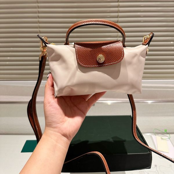 2023 new handbag clearance nylon bag small dumpling purse bags lady leather patchwork handbag for women french mini clutch bag
2023 new handbag clearance nylon bag small dumpling purse bags lady leather patchwork handbag for women french mini clutch bag