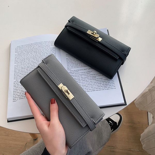 designer wallet luxury fashion litchi pattern solid color womens handbag pu material multi card with lock buckle mid length
designer wallet luxury fashion litchi pattern solid color womens handbag pu material multi card with lock buckle mid length