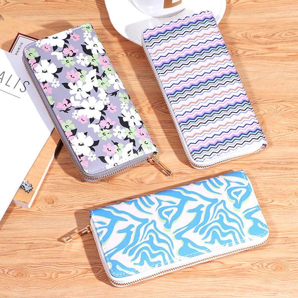 new women's wallet simple multifunctional large capacity fashionable phone bag printed multi card handheld bag
new women's wallet simple multifunctional large capacity fashionable phone bag printed multi card handheld bag