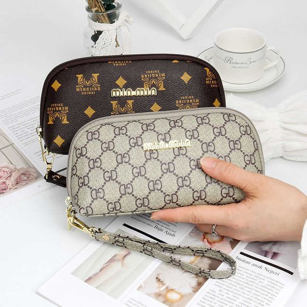 new japanese and korean hand bag women's hand bag large capacity zero wallet fashion trend shell bag small bag long wallet
new japanese and korean hand bag women's hand bag large capacity zero wallet fashion trend shell bag small bag long wallet