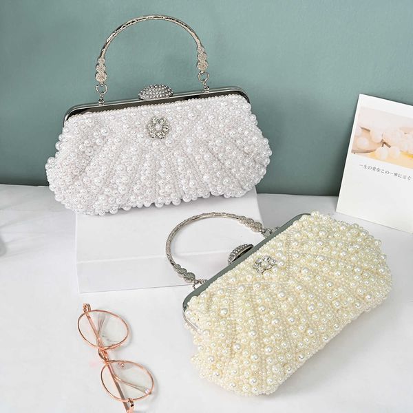 women carrying temperament pearl dinner bag cheongsam bag women's banquet commuting fashion celebrity party bag
women carrying temperament pearl dinner bag cheongsam bag women's banquet commuting fashion celebrity party bag
