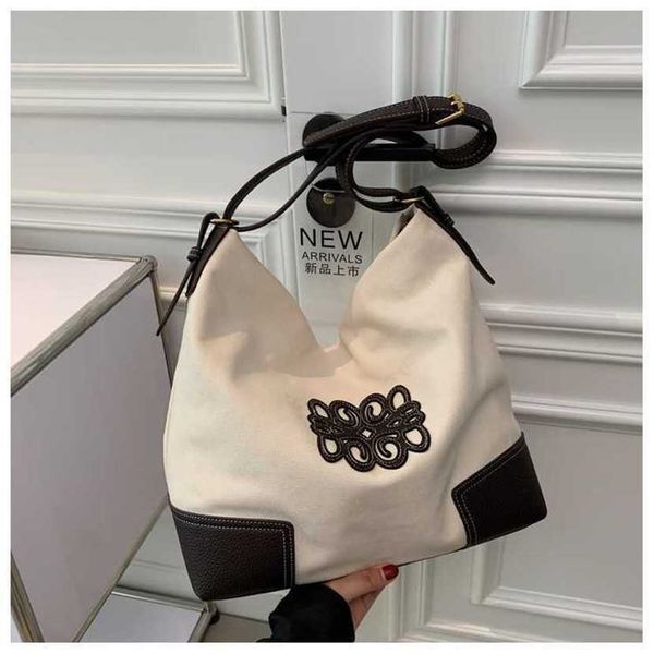 designer bag 2023 handbag contrast canvas tote women new high capacity for students commuting to class one shoulder crossbody
designer bag 2023 handbag contrast canvas tote women new high capacity for students commuting to class one shoulder crossbody