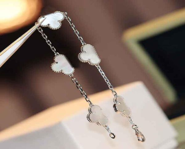 luxurious quality five flowers charm bracelet with white shell for women wedding jewelry gift ps82096966756, Golden;silver
luxurious quality five flowers charm bracelet with white shell for women wedding jewelry gift ps82096966756, Golden;silver
