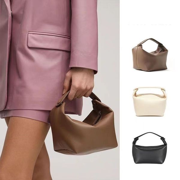 the row half moon bag in smooth leather women designer with flat shoulder strap and curved zipper closure clutch tote suded lining underarm
the row half moon bag in smooth leather women designer with flat shoulder strap and curved zipper closure clutch tote suded lining underarm