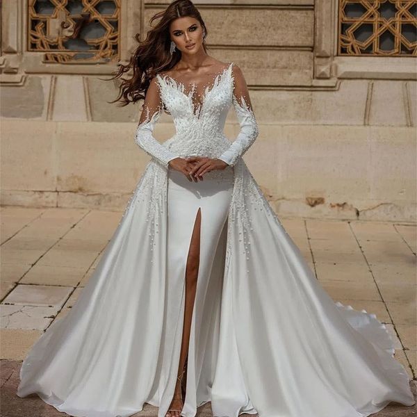 luxury mermaid wedding dresses front slit pearls beaded satin long sleeves bridal gowns with detachable train sheer neck modern arabic dubai, White
luxury mermaid wedding dresses front slit pearls beaded satin long sleeves bridal gowns with detachable train sheer neck modern arabic dubai, White