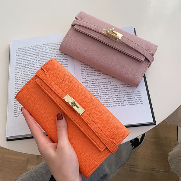 luxury designer wallet women solid color handbag pu material lychee pattern simple and fashionable buckle multiple card slots
luxury designer wallet women solid color handbag pu material lychee pattern simple and fashionable buckle multiple card slots