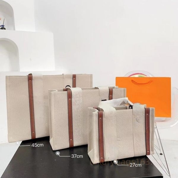 alphabet handbag designer handbag canvas leather three-dimensional handbag large-capacity underarm shoulder bag in three sizes.
alphabet handbag designer handbag canvas leather three-dimensional handbag large-capacity underarm shoulder bag in three sizes.