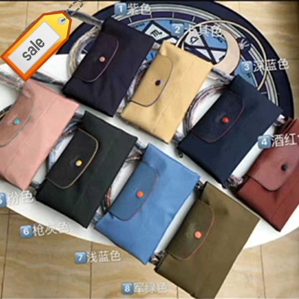 women's designer bags high version 70th anniversary longxiang bag commemorative nylon embroidery tote mini dumpling mummy factory direc
women's designer bags high version 70th anniversary longxiang bag commemorative nylon embroidery tote mini dumpling mummy factory direc