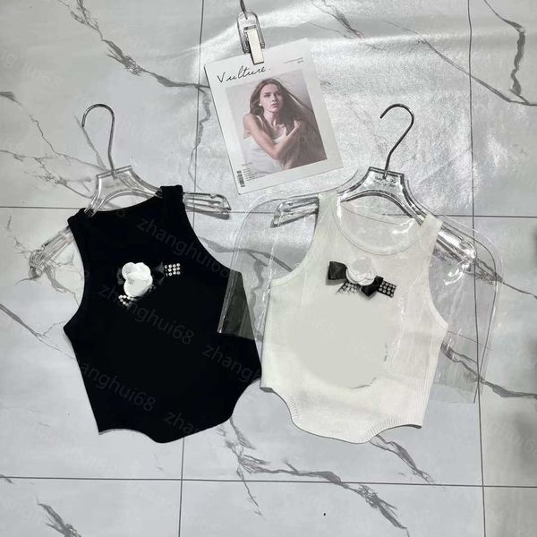 23ss womens knits womens designer clothing camellia bow glue drill figure 5 flower pearl decoration knitted vest womens clothes, White
23ss womens knits womens designer clothing camellia bow glue drill figure 5 flower pearl decoration knitted vest womens clothes, White
