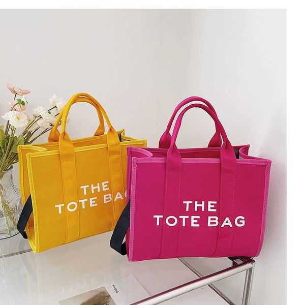 sell evening bags classic marc tote bag letter canvas totes women designers handbags fashion large capacity shoulder shopping bags travel be
sell evening bags classic marc tote bag letter canvas totes women designers handbags fashion large capacity shoulder shopping bags travel be