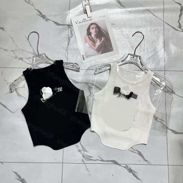 23ss womens knits womens designer clothing camellia bow glue drill figure 5 flower pearl decoration knitted vest womens clothes a1, White
23ss womens knits womens designer clothing camellia bow glue drill figure 5 flower pearl decoration knitted vest womens clothes a1, White