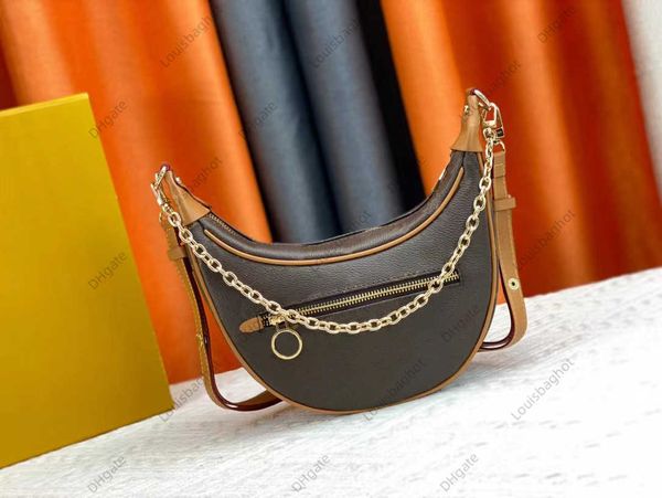7a quality luxury loop half moon shoulder bag leather famous clutch m81098 handbag designer women's men two shoulder straps metal fitti
7a quality luxury loop half moon shoulder bag leather famous clutch m81098 handbag designer women's men two shoulder straps metal fitti