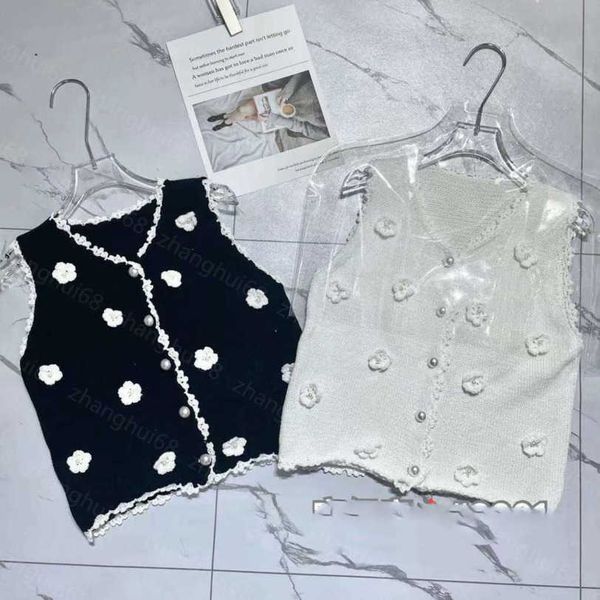 23ss womens knits womens designer clothing solid colored flower pearl figure 5 decoration knitted vest womens clothes a1, White
23ss womens knits womens designer clothing solid colored flower pearl figure 5 decoration knitted vest womens clothes a1, White