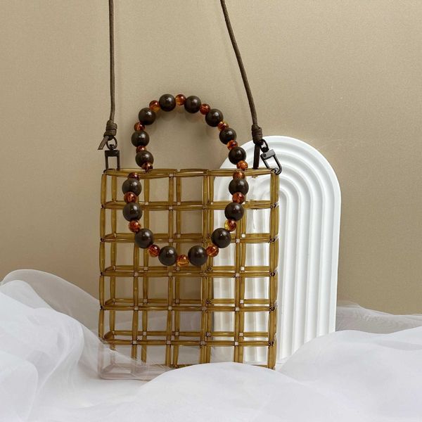 2023 summer new checkered hollow handmade beaded bag acrylic beaded weaving leisure tourism crossbody bag 230625
2023 summer new checkered hollow handmade beaded bag acrylic beaded weaving leisure tourism crossbody bag 230625