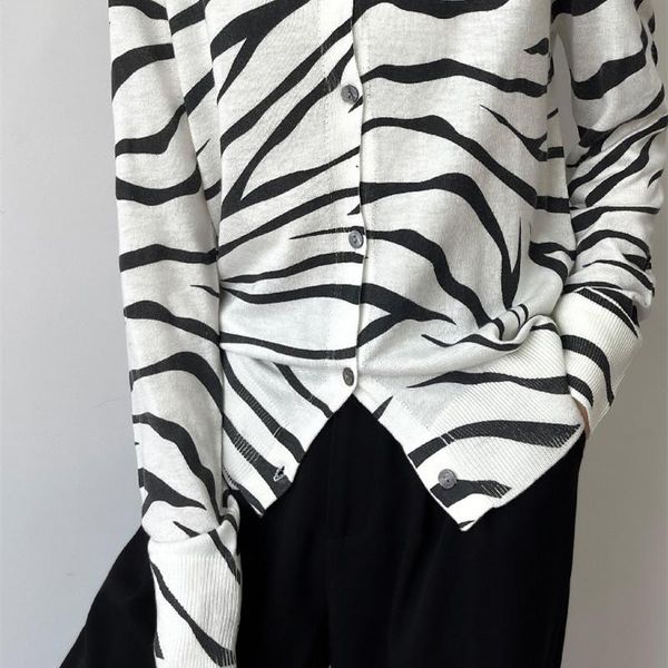 sweaters worsted wool knitted cardigan women's 23 spring and autumn thin zebra pattern fashion jacket simple sweater chic loose retro t, White;black
sweaters worsted wool knitted cardigan women's 23 spring and autumn thin zebra pattern fashion jacket simple sweater chic loose retro t, White;black