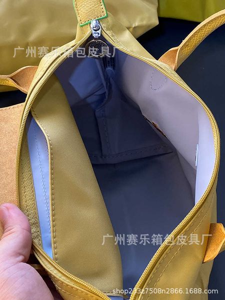 women's designer bags underarm bag new french embroidery longxiang bag 70th anniversary one shoulder dumpling waterproof oxford fabric
women's designer bags underarm bag new french embroidery longxiang bag 70th anniversary one shoulder dumpling waterproof oxford fabric
