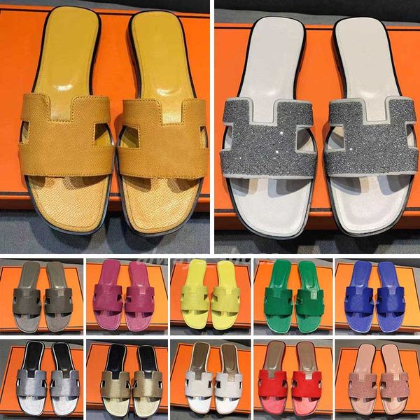 2023 famous brand beach slippers classic flat heel summer designer fashion flops leather lady slides women shoes l bath ladies sandals large
2023 famous brand beach slippers classic flat heel summer designer fashion flops leather lady slides women shoes l bath ladies sandals large