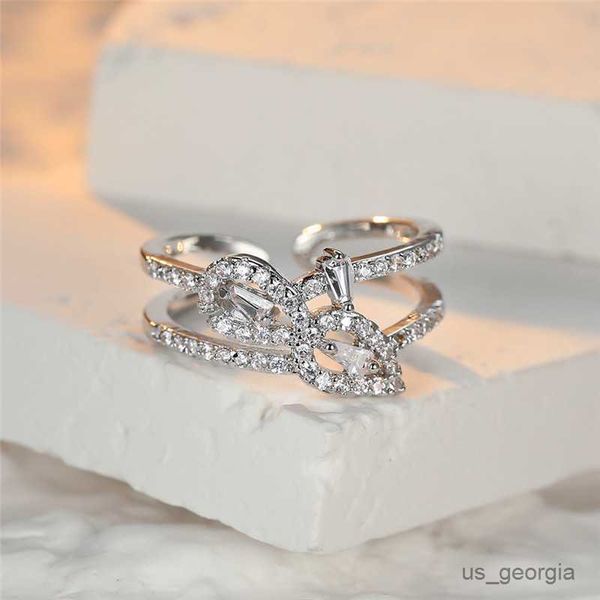 band rings trendy female crystal hollow leaf ring charm silver color engagement ring luxury white zircon stone wedding rings for women r2306
band rings trendy female crystal hollow leaf ring charm silver color engagement ring luxury white zircon stone wedding rings for women r2306