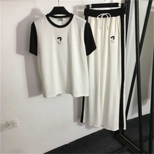 summer womens two piece pants xiao xiang logo embroidery color blocking short-sleeved t-shirt elastic waist wide leg pants sets for women ou, White
summer womens two piece pants xiao xiang logo embroidery color blocking short-sleeved t-shirt elastic waist wide leg pants sets for women ou, White