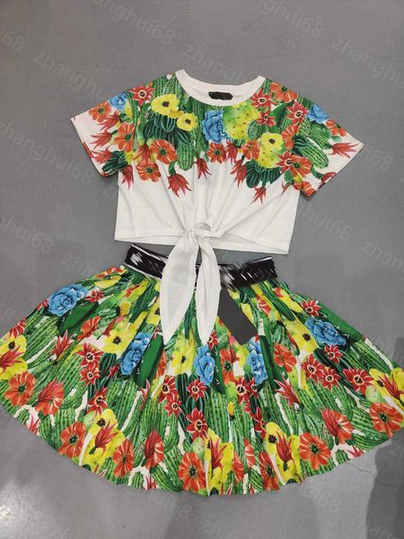 23ss womens designer clothing skirt set round neck cucumber print strap short sleeve t-shirt letter ribbon patchwork pleated half skirt sets, White
23ss womens designer clothing skirt set round neck cucumber print strap short sleeve t-shirt letter ribbon patchwork pleated half skirt sets, White