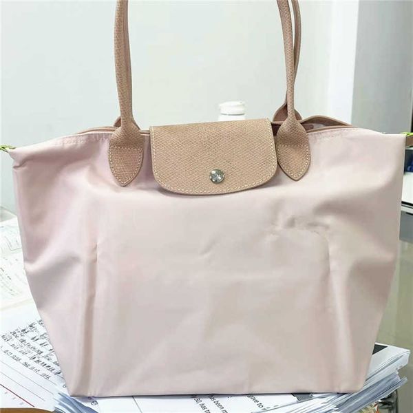 women's designer bags french longxiang classic nylon embroidered dumpling bun tote mini crossbody factory direct sales
women's designer bags french longxiang classic nylon embroidered dumpling bun tote mini crossbody factory direct sales