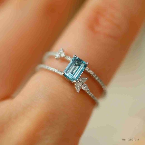 band rings cute female light blue hollow ring charm silver color open wedding rings for women luxury square zircon stone engagement ring r23
band rings cute female light blue hollow ring charm silver color open wedding rings for women luxury square zircon stone engagement ring r23