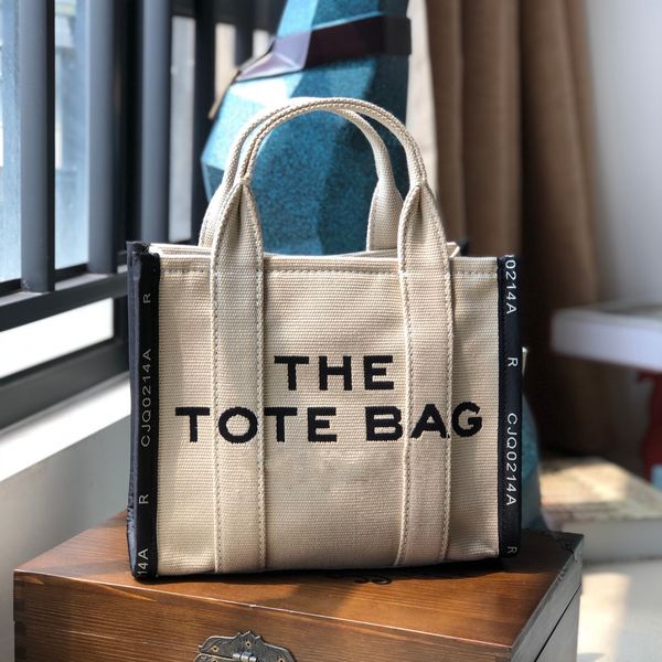 the canvas tote bag designer handbags totes sewing letter logo luxury lady fashion crossbody patchwork marc shopping bags
the canvas tote bag designer handbags totes sewing letter logo luxury lady fashion crossbody patchwork marc shopping bags