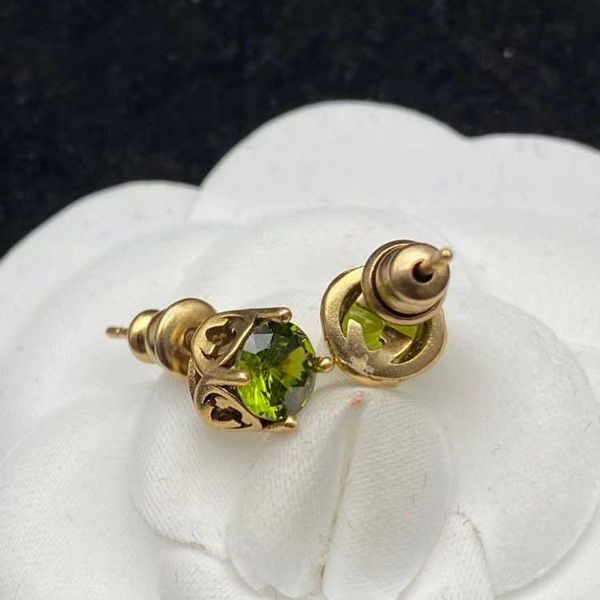 double set green zircon small design silver needle earrings female, Golden
double set green zircon small design silver needle earrings female, Golden