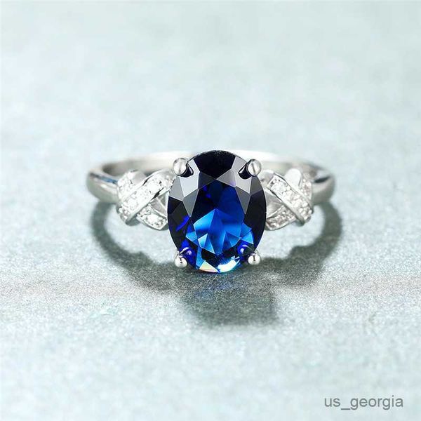 band rings luxury female blue crystal stone ring classic silver color cross wedding rings for women dainty bridal oval engagement ring r2306
band rings luxury female blue crystal stone ring classic silver color cross wedding rings for women dainty bridal oval engagement ring r2306