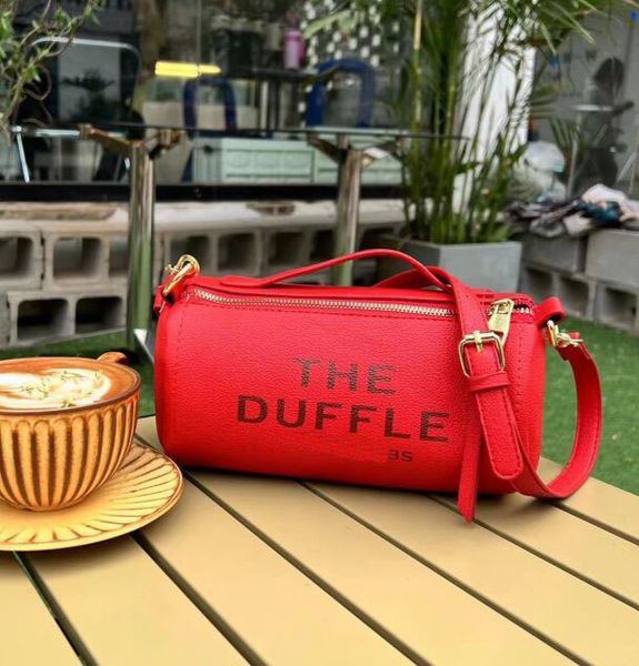 designer the leather duffle bag shoulder barrel shaped tote women lady crossbody pu leather luxury handbag beach m0625, Black;red
designer the leather duffle bag shoulder barrel shaped tote women lady crossbody pu leather luxury handbag beach m0625, Black;red